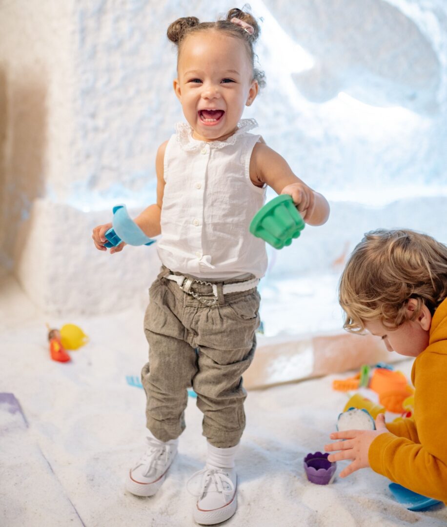 Kids enjoying indoor play with toys